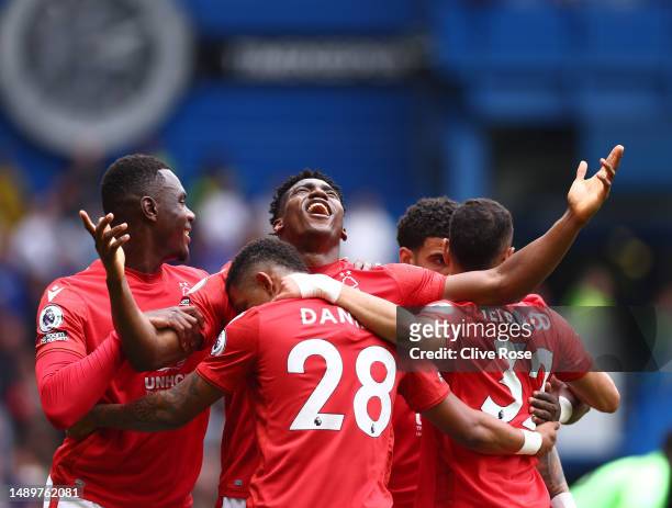 Taiwo Awoniyi of Nottingham Forest celebrates after scoring the team's first goal during the Premier League match between Chelsea FC and Nottingham...