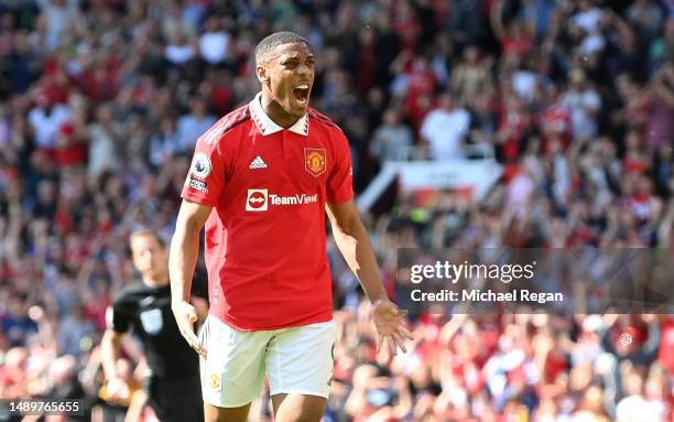 Anthony Martial of Manchester United celebrates after scoring the team's first goal during the Premier League match between Manchester United and...