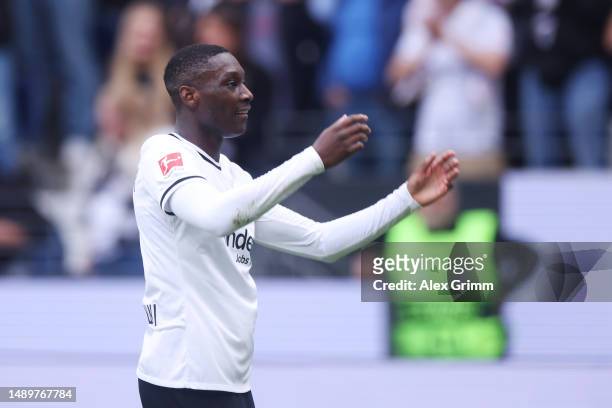 Randal Kolo Muani of Eintracht Frankfurt celebrates after scoring the team's third goal during the Bundesliga match between Eintracht Frankfurt and...