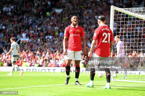 Anthony Martial of Manchester United celebrates scoring to make it 1-0 with team mate Antony during the Premier League match between Manchester...