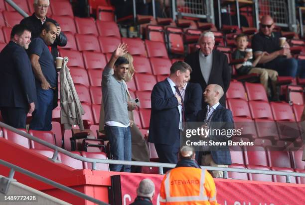 Rishi Sunak, Prime Minister of the United Kingdom, acknowledges the fans during the Premier League match between Southampton FC and Fulham FC at...