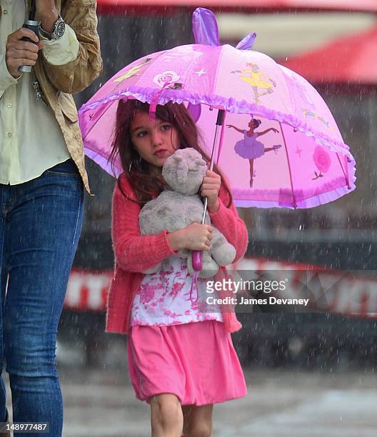 Suri Cruise seen walking in the rain in the Meat Packing District on July 20, 2012 in New York City.