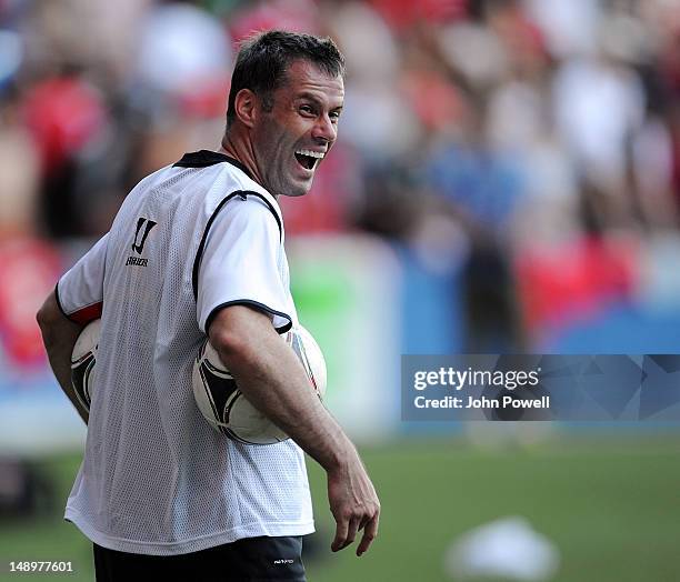 Jamie Carragher of Liverpool FC laughs during a training session in the Rogers Centre on July 19, 2012 in Toronto, Canada.