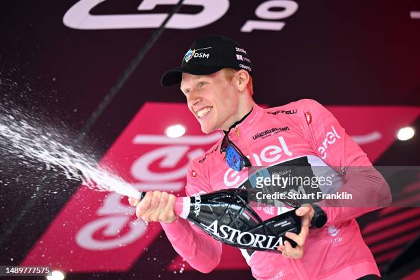 Andreas Leknessund of Norway and Team DSM celebrates at podium as Pink Leader Jersey winner during the 106th Giro d'Italia 2023, Stage 8 a 207km...
