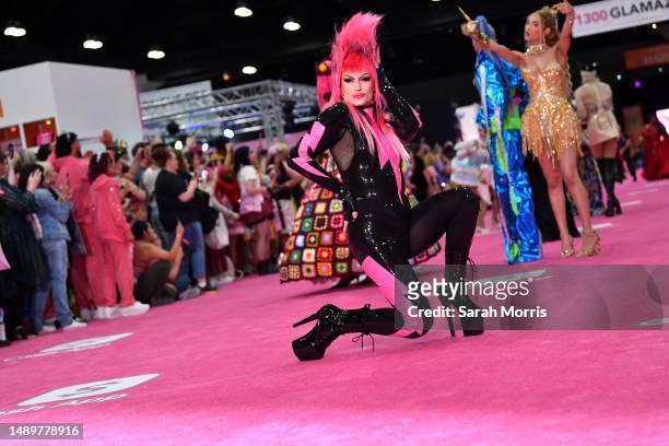 Drag performer walks the pink carpet during the Queens Walk at RuPaul's DragCon LA 2023 at Los Angeles Convention Center on May 12, 2023 in Los...