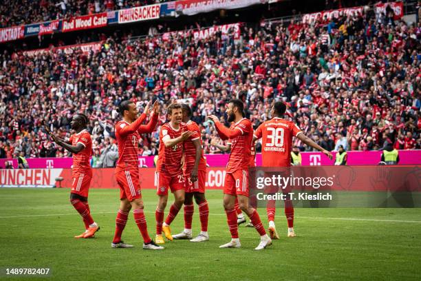 The players of FC Bayern Muenchen celebrate the goal of Noussair Mazraoui of FC Bayern Muenchen during the Bundesliga match between FC Bayern München...