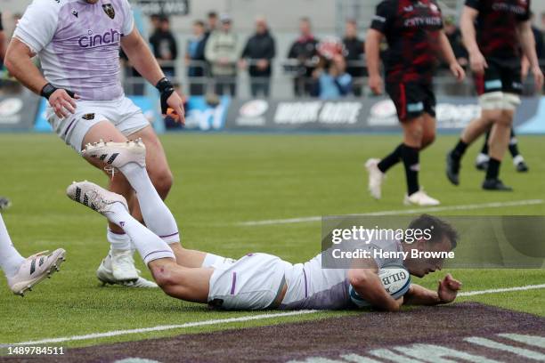 Alex Mitchell of Northampton Saints scores the team's first try during the Gallagher Premiership Semi-Final match between Saracens and Northampton...