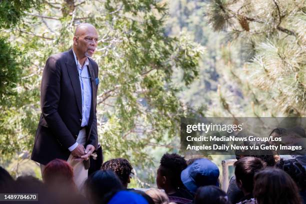 Angeles Forest , CA NBA legend Kareem Abdul-Jabbar visits with LAUSD school children during their stay at Camp Skyhook, an outdoor science camp for...
