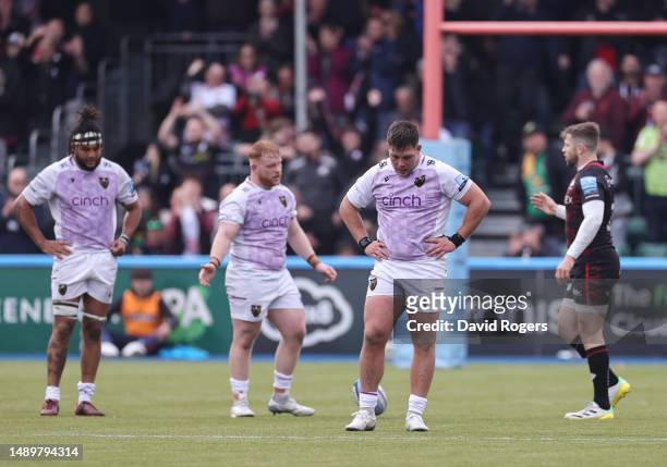 Ethan Waller of Northampton Saints looks dejected as players of Northampton Saints shakes hands with players of Saracens after the Gallagher...