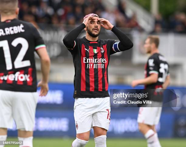 Theo Hernandez of AC Milan reacts during the Serie A match between Spezia Calcio and AC Milan at Stadio Alberto Picco on May 13, 2023 in La Spezia,...