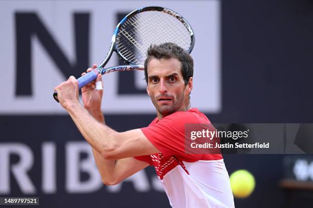 Albert Ramos-Vinolas of Spain plays a backhand during their singles second round match against Carlos Alcaraz of Spain during day six of the...