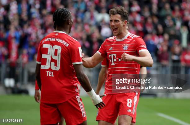Mathys Tel of FC Bayern Muenchen celebrates with teammateLeon Goretzka of FC Bayern Muenchen after scoring his team's fifth goal during the...