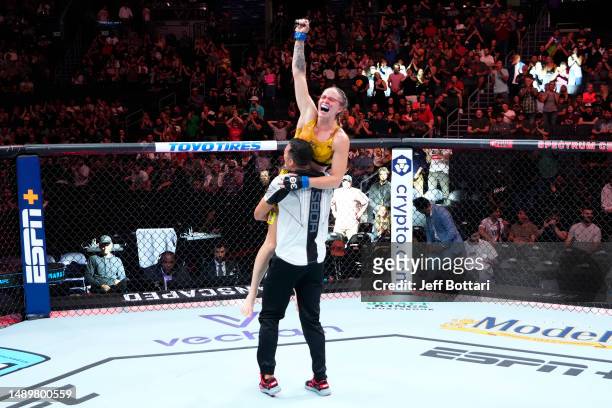Tainara Lisboa of Brazil celebrates after submitting Jessica-Rose Clark of Australia in a bantamweight fight during the UFC Fight Night event at...