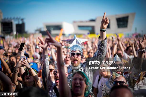 Eurovision fans enjoy the party atmosphere as they gather in Liverpool to watch the Eurovision Song Contest final on a giant screen in the Eurovision...