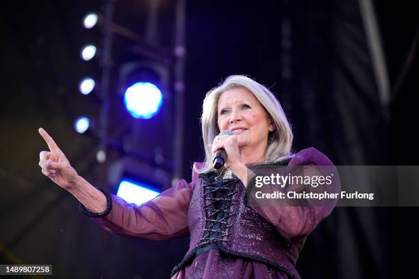Eurovision winner Sandie Shaw entertains the crowd as fans gather in Liverpool to watch the Eurovision Song Contest final on a giant screen in the...
