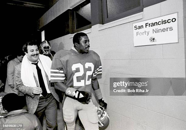 San Francisco 49ers Dwight Hicks celebrates victory and walks to locker room after Super Bowl XIX win over Miami Dolphins, January 20, 1985 in...