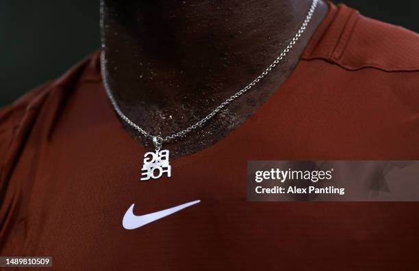 Detailed view of the necklace of Frances Tiafoe of The United States in his men's single second round match against Daniel Altmaier of Germany during...