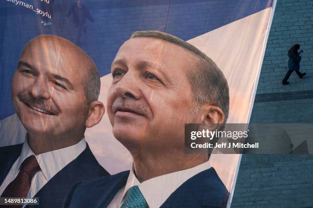 Flags fly over Taksim Square showing Turkey's President Recep Tayyip Erdogan and CHP presidential candidate, Kemal Kilicdaroglu on May 13, 2023 in...