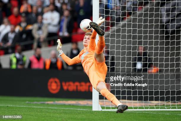 Archie Mair of Notts County saves the penalty kick of Jeff King of Chesterfield during the Vanarama National League Play-Off Final match between...