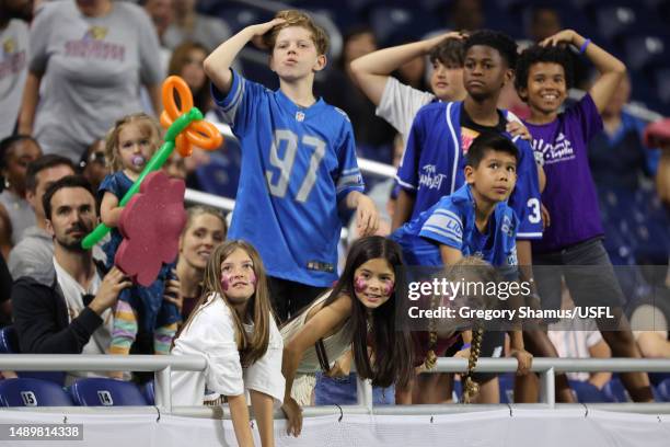 The Michigan Panthers fans look to catch t-shirts being thrown into the stands during the second quarter against the Pittsburgh Maulers at Ford Field...