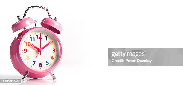 pink alarm clock, with copy space - alarm clock white background stock pictures, royalty-free photos & images