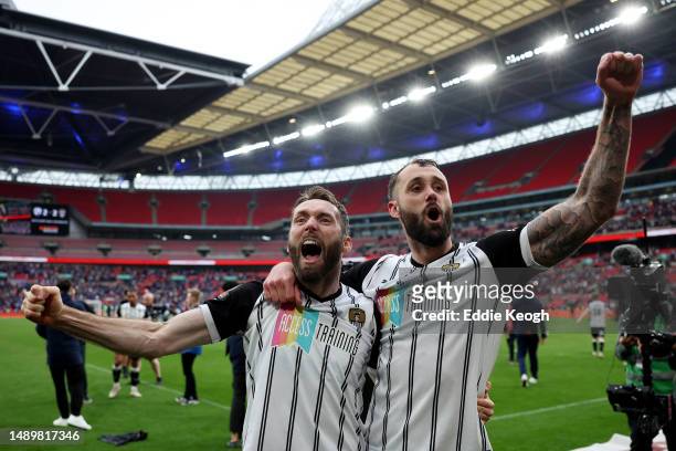 James O'Brien and Connell Rawlinson of Notts County celebrate after defeating Chesterfield in a penalty shootout 4-3 to secure promotion to League...