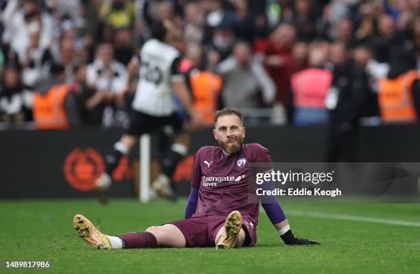 Ross Fitzsimons of Chesterfield looks dejected after Cedwyn Scott of Notts County scores the teams fifth penalty of the penalty shoot-out to defeat...