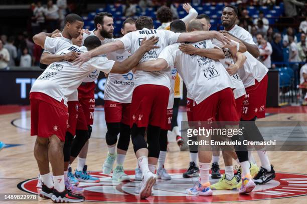 Players of EA7 Emporio Armani Olimpia Milano bond prior to the start of Game One of the Quarterfinals of LBA Lega Basket Serie A Playoffs between EA7...