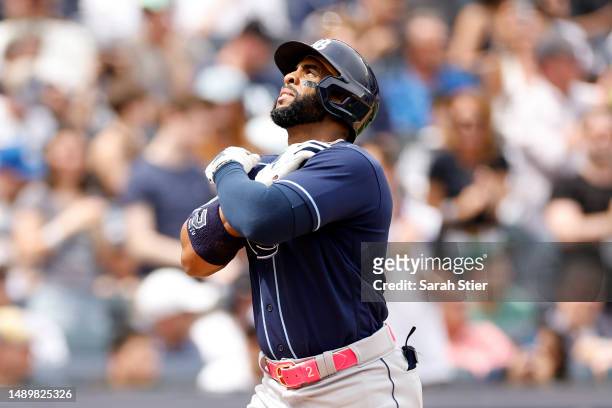 Yandy Diaz of the Tampa Bay Rays celebrates after hitting a grand slam during the fifth inning against the New York Yankees at Yankee Stadium on May...