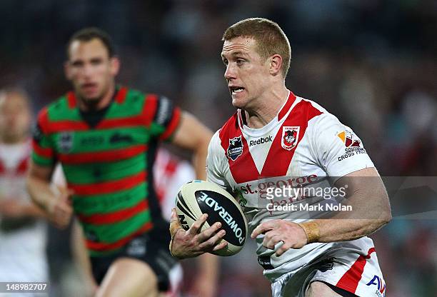 Ben Creagh makes a line break to score during the round 20 NRL match between the South Sydney Rabbitohs and the St George Illawarra Dragons at ANZ...