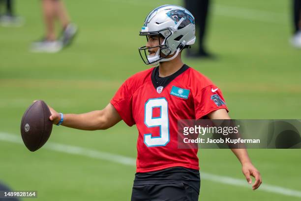 Bryce Young of the Carolina Panthers works through a drill during practice at Bank of America Stadium on May 13, 2023 in Charlotte, North Carolina.