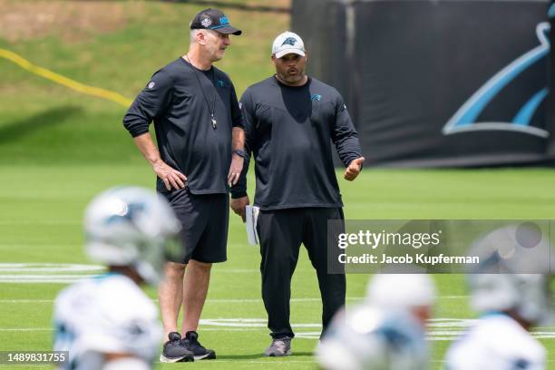 Head coach Frank Reich and assistant head coach/running backs coach Duce Staley of the Carolina Panthers look on during Carolina Panthers Rookie...