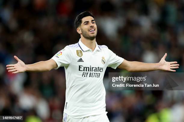 Marco Asensio of Real Madrid celebrates after scoring the team's first goal during the LaLiga Santander match between Real Madrid CF and Getafe CF at...