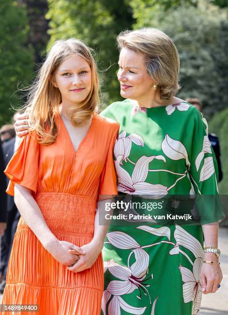 Princess Eleonore of Belgium and Queen Mathilde of Belgium attend a garden party at Laken Castle to celebrate the 10th reigning jubilee of the...