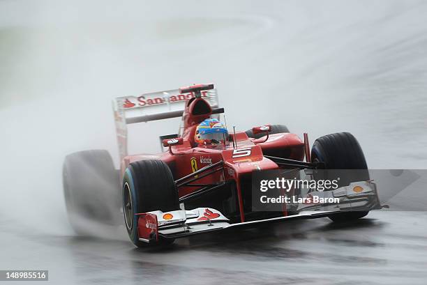 Fernando Alonso of Spain and Ferrari drives on his way to finishing first during qualifying for the German Grand Prix at Hockenheimring on July 21,...