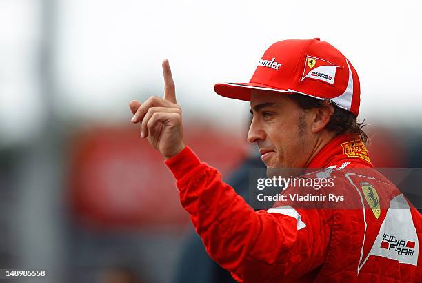 Pole sitter Fernando Alonso of Spain and Ferrari celebrates after qualifying for the German Grand Prix at Hockenheimring on July 21, 2012 in...