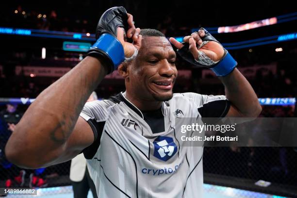 Jailton Almeida of Brazil celebrates his submission victory over Jairzinho Rozenstruik of Suriname in their heavyweight fight during the UFC Fight...