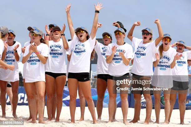 The USC Trojans celebrate their victory over the UCLA Bruins during the Division I Womens Beach Volleyball Championship held at Gulf Shores Public...