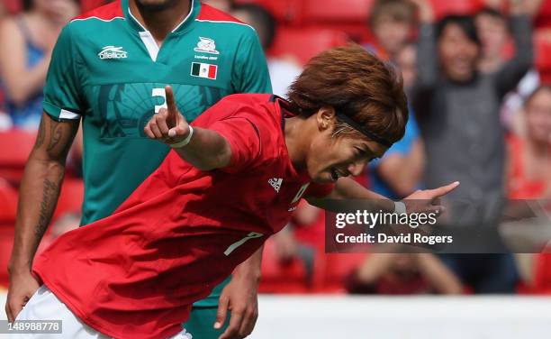 Yuki Otsu of Japan celebrates after scoring the match winning goal during the friendly international match between Japan and Mexico at the City...