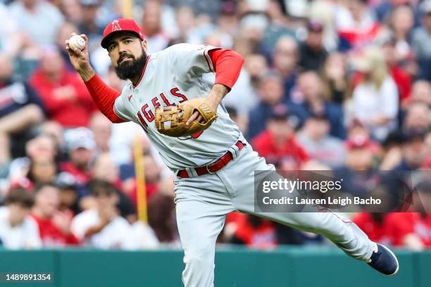 Anthony Rendon of the Los Angeles Angels throws out Cam Gallagher of the Cleveland Guardians at first base during the fifth inning of the game at...