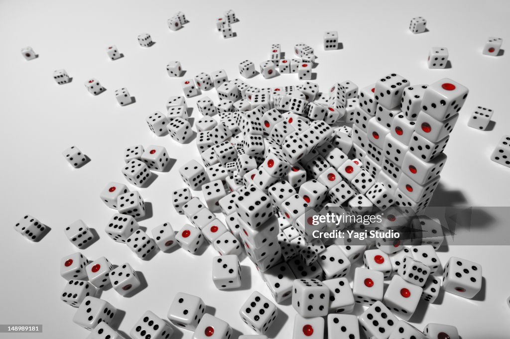 Many dice on white background