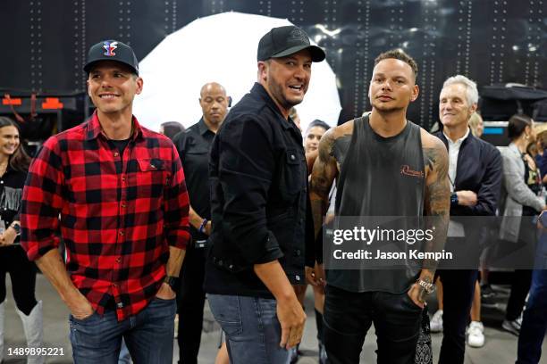 Granger Smith, Luke Bryan, Kane Brown, and President, Entertainment Enterprises for iHeartMedia, Inc., John Sykes attend the 2023 iHeartCountry...