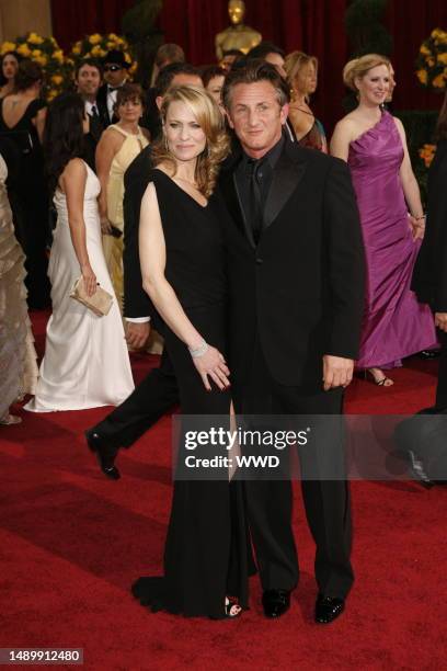 Robin Wright Penn and Sean Penn attend the 81st annual Academy Awards at the Kodak Theatre. Wright Penn wears Monique Lhuiller and Penn wears Giorgio...