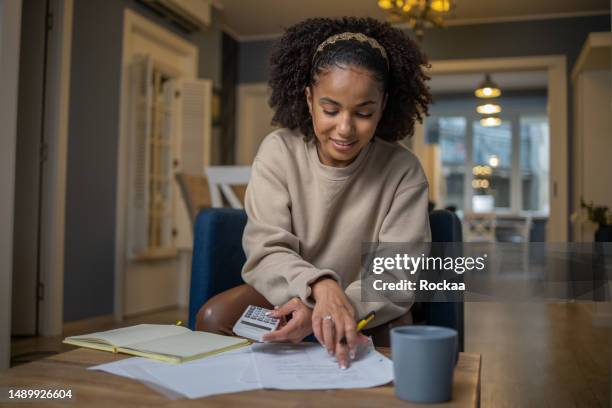 doing taxes - investment stock pictures, royalty-free photos & images