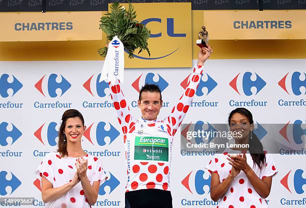 Thomas Voeckler of France and Team Europcar celebrates on the podium after securing the polka dot jersey for the King of the Mountains competition...