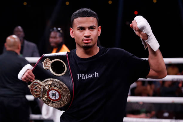 Rolando Romero poses after defeating Ismael Barroso for a vacant WBA super lightweight title at The Cosmopolitan of Las Vegas on May 13, 2023 in Las...