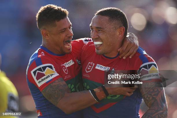 Dane Gagai and Tyson Frizell of the Knights celebrate Tyson Frizell scoring a try during the round 11 NRL match between Newcastle Knights and Gold...