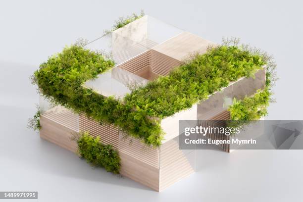 futuristic block structure with plant. ecosystem - city block ストックフォトと画像