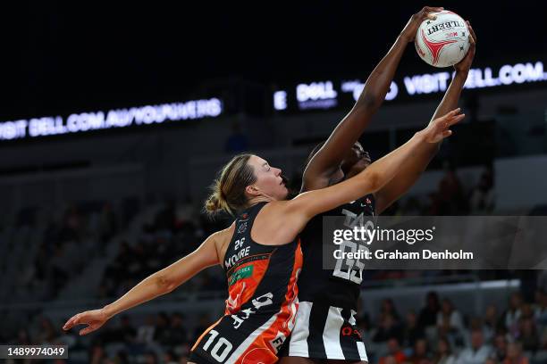 Shimona Nelson of the Magpies and Lauren Moore of the Giants competes for the ball during the round nine Super Netball match between Collingwood...