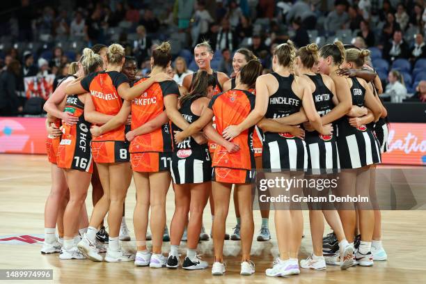 The Magpies and Giants embrace following the round nine Super Netball match between Collingwood Magpies and Giants Netball at John Cain Arena on May...